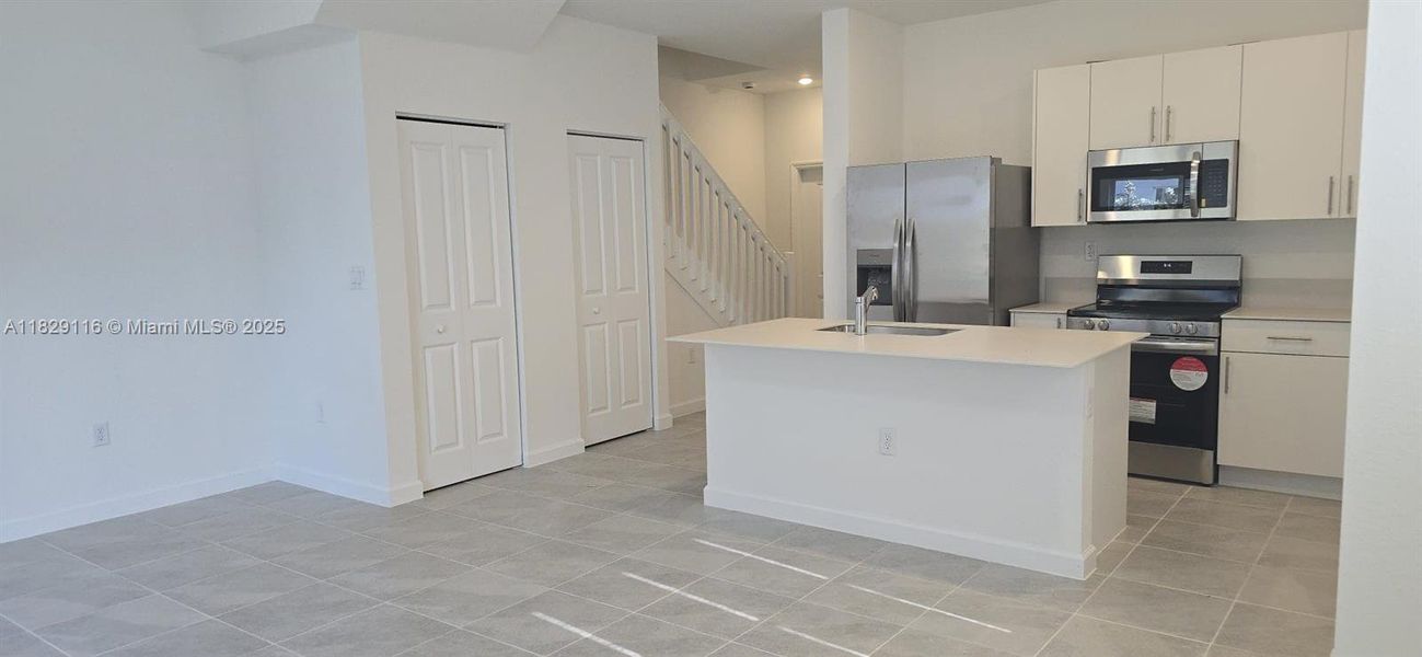 Furnished interior view inside a new home in Le Jardine, Florida City (Image 10).