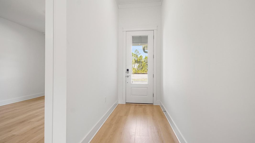Representative unfurnished interior of a home built from the Pier by D.R. Horton in Breakfast Point East Phase II, Panama City Beach (Image 23).
