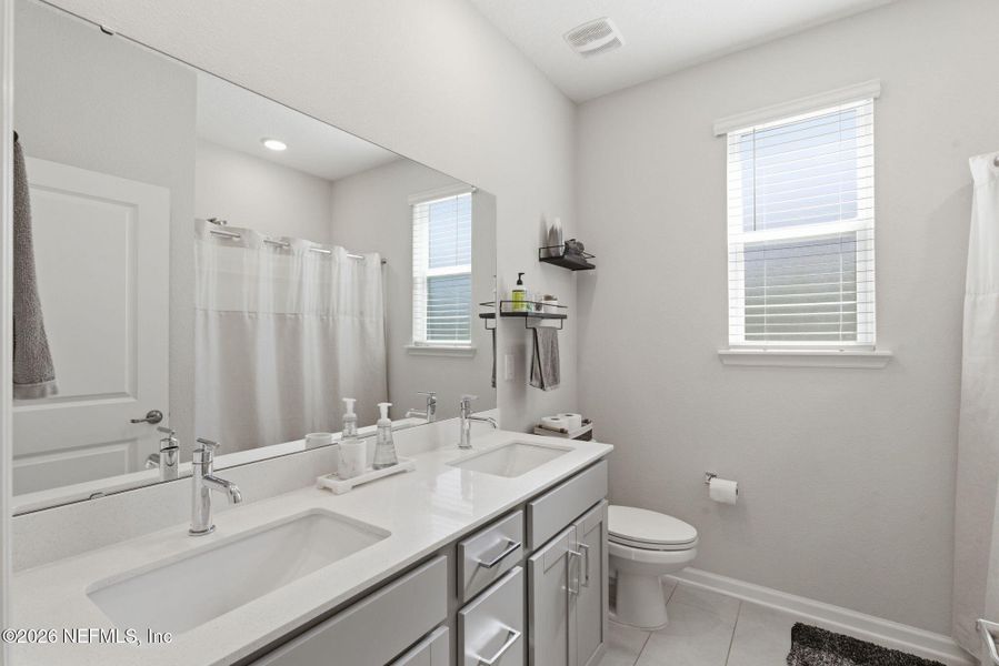Furnished interior view inside a new home in RiverTown - Settlement, St. Johns (Image 7).