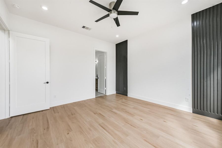 The corner door leads to the primary bathroom.