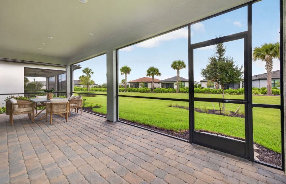 Exterior details and patio area of a home in Arbor Oaks, North Port (Image 3).