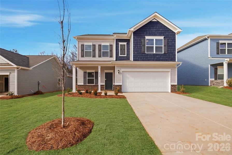 Front exterior of a new home in Catawba Trace, Catawba, NC, highlighting curb appeal (Image 23). Front exterior of a new home in Catawba Trace, Catawba, NC, highlighting curb appeal (Image 23).