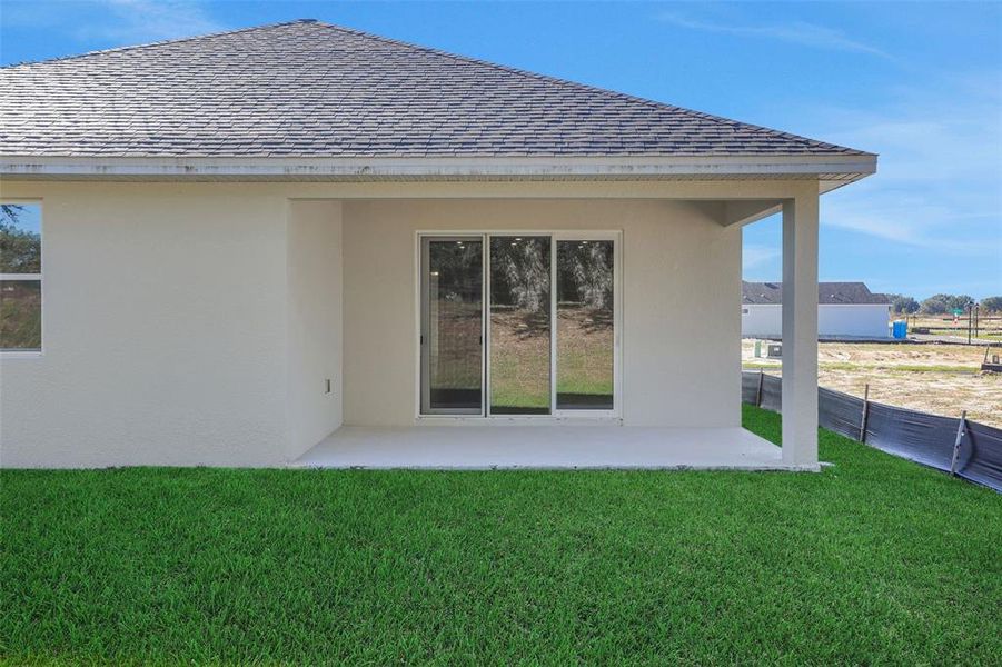 Exterior details and patio area of a home in Crossroads at Kelly Park, Apopka (Image 4). Exterior details and patio area of a home in Crossroads at Kelly Park, Apopka (Image 4).