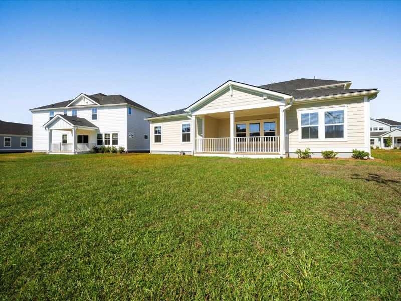 Exterior details and patio area of a home in The Coves at Lakes of Cane Bay II, Summerville (Image 23).