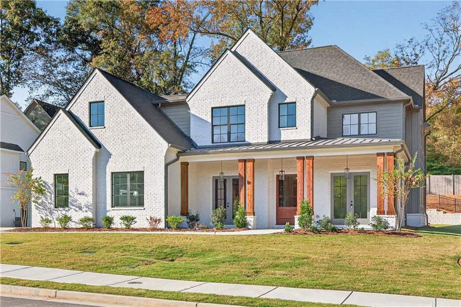 Front exterior of a new home in Town Farms, Peachtree Corners, GA, highlighting curb appeal (Image 28).