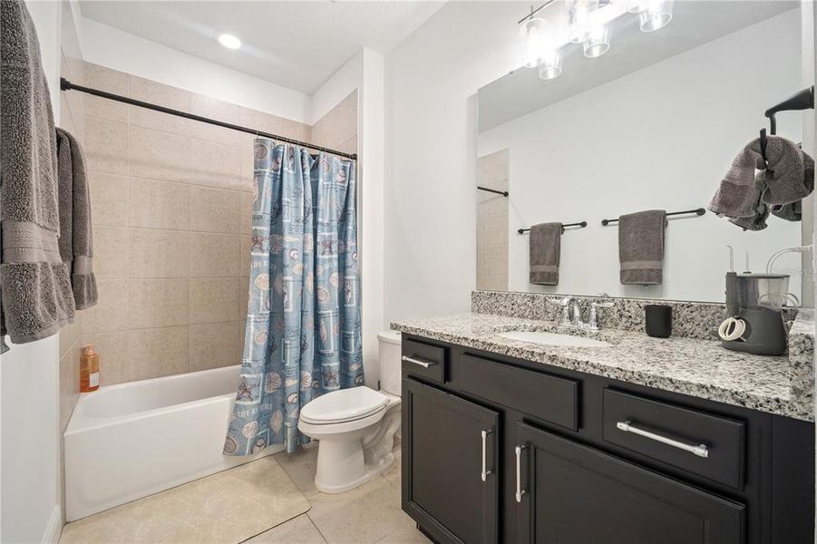 Furnished interior view inside a new home in Northlake at Ovation, Winter Garden (Image 36).