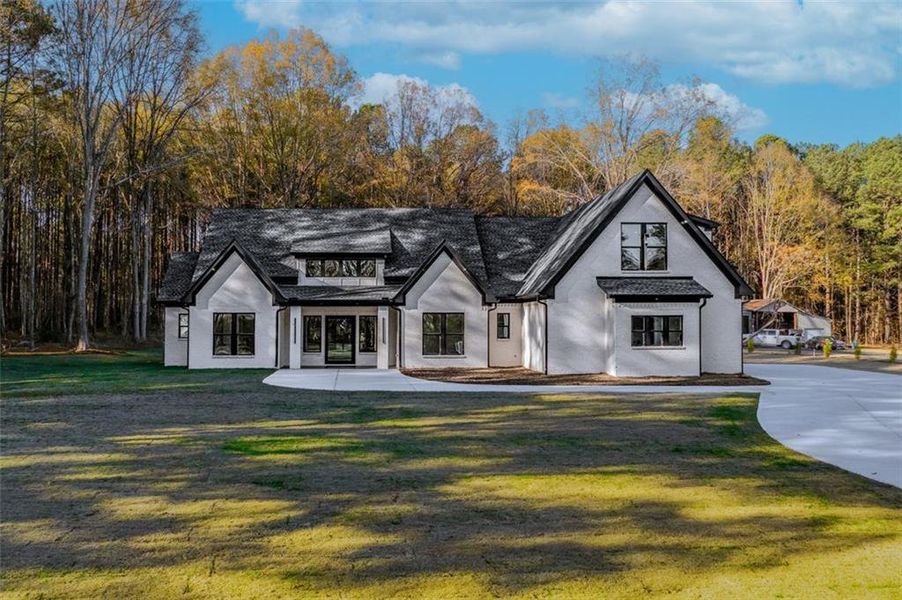 Front exterior of a new home in , Monroe, GA, highlighting curb appeal (Image 28).