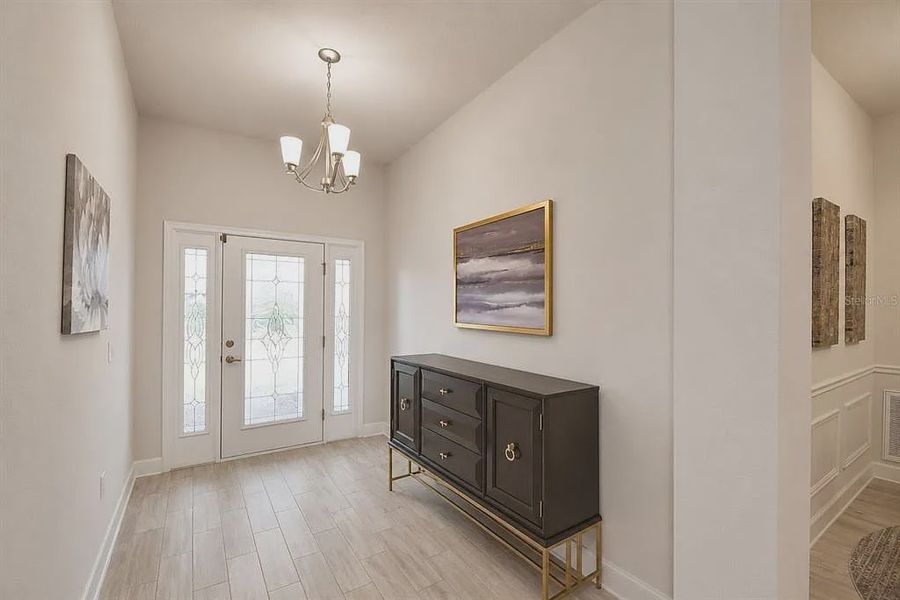 Furnished interior view inside a new home in Lake Juliana Estates, Auburndale (Image 6).