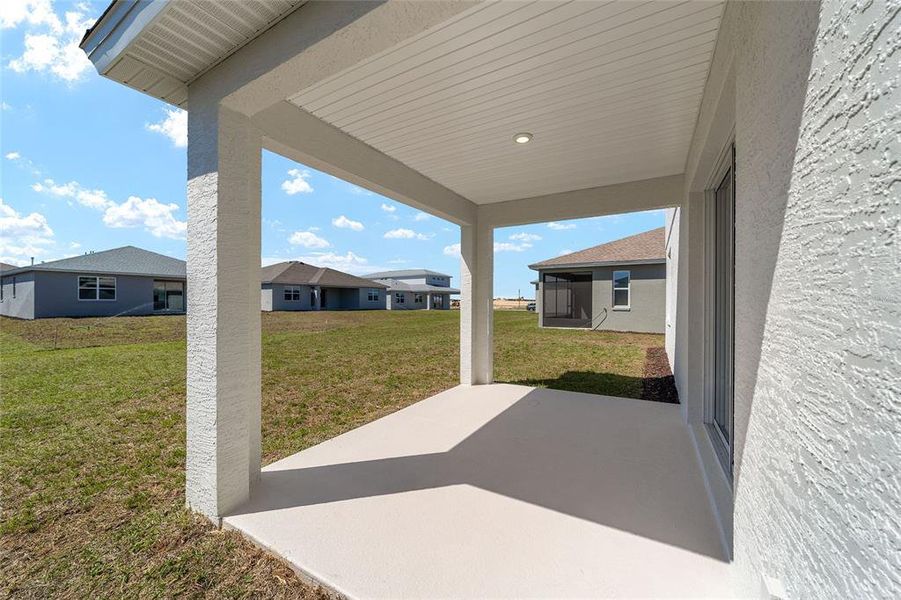 Exterior details and patio area of a home in Calesa Township, Ocala (Image 4).