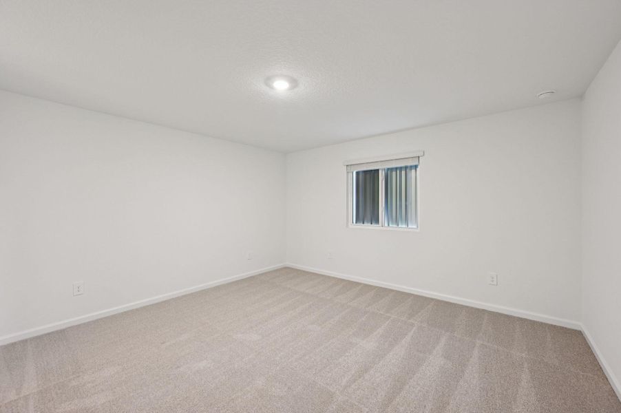 Spacious, unfurnished interior of a new home in Meritage Homes at Terra Lago - Premier Series, Indiantown (Image 15).