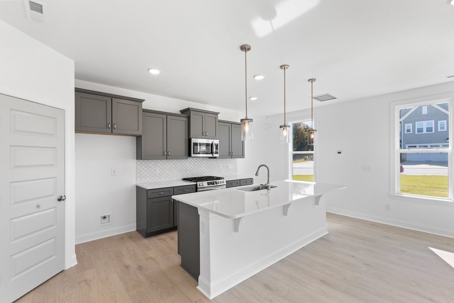 Representative furnished interior of a home built from the The Hemlock by RobuckHomes in Kennebec Crossing, Angier (Image 19).