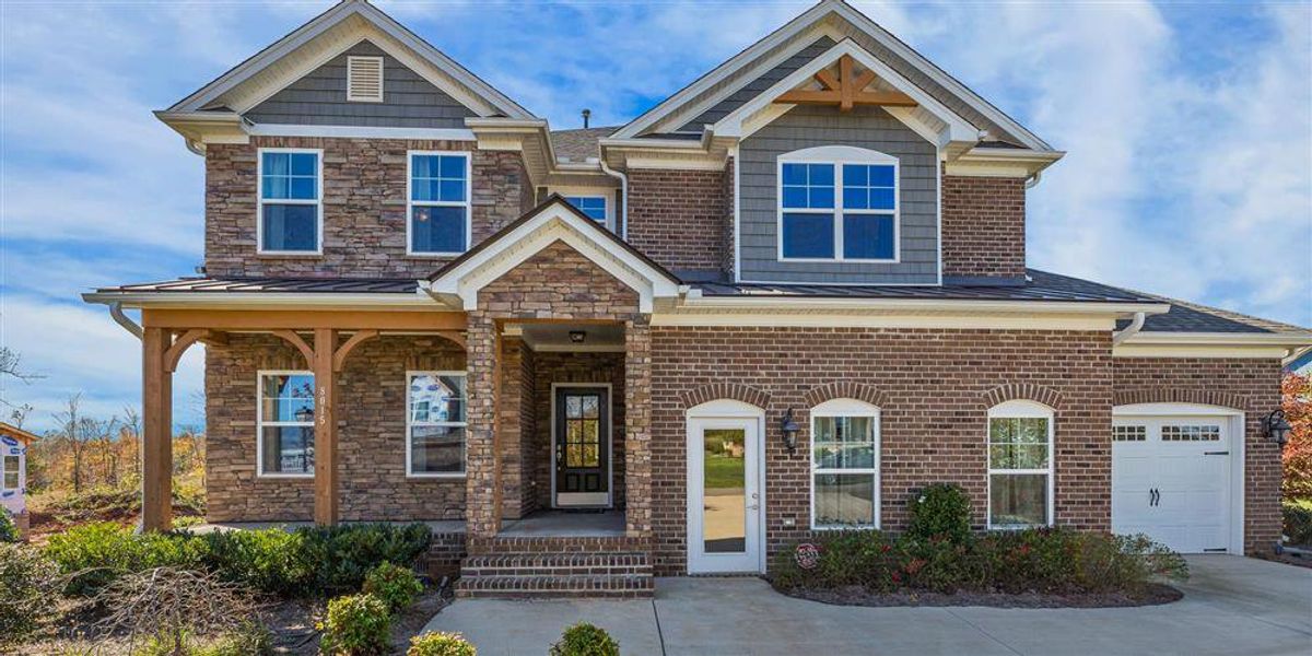 Representative exterior photo of a completed home built from the Hanover Lux by Keystone Homes NC in Northwest Meadows, Stokesdale, NC (Image 42). Representative exterior photo of a completed home built from the Hanover Lux by Keystone Homes NC in Northwest Meadows, Stokesdale, NC (Image 42).
