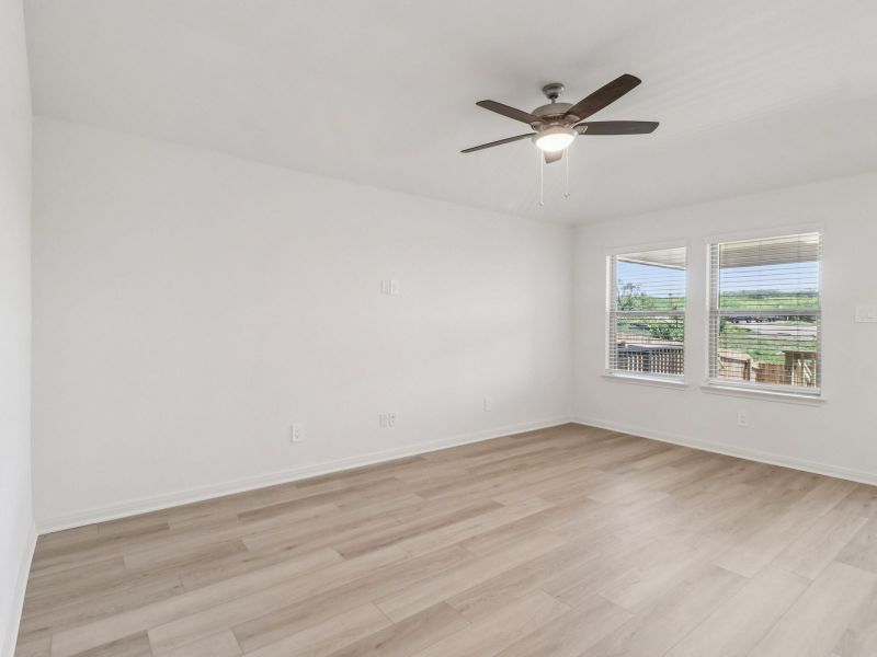Living room in the Callaghan floorplan at a Meritage Homes community. Living room in the Callaghan floorplan at a Meritage Homes community.