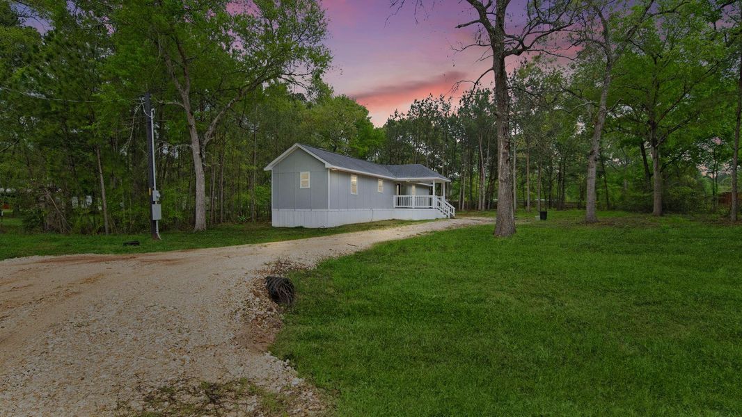 Front exterior of a new home in , Waller, TX, highlighting curb appeal (Image 12). Front exterior of a new home in , Waller, TX, highlighting curb appeal (Image 12).