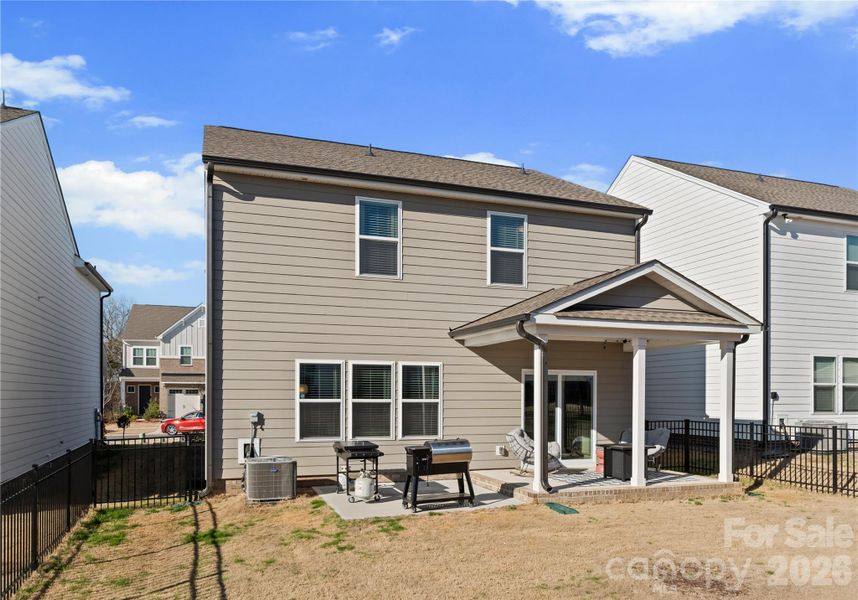 Exterior details and patio area of a home in Scotch Meadows, Monroe (Image 21).