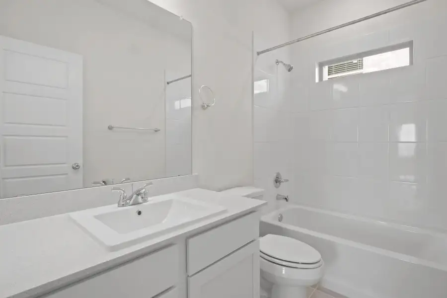 Bathroom in the Pecan II home plan by Trophy Signature Homes – REPRESENTATIVE PHOTO Bathroom in the Pecan II home plan by Trophy Signature Homes – REPRESENTATIVE PHOTO