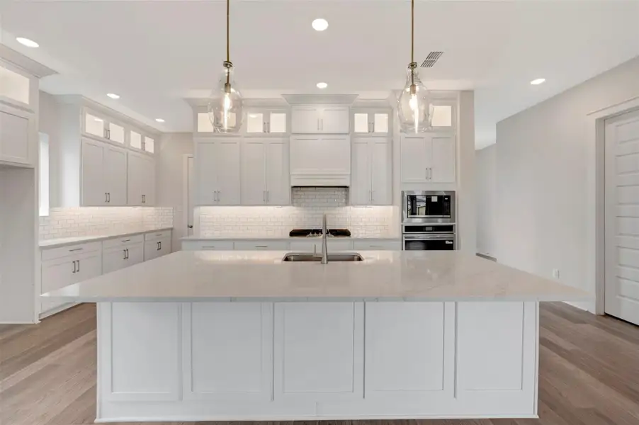 Furnished interior view inside a new home in Elyson 40', Katy (Image 10).