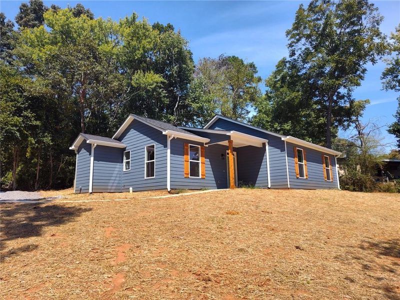 Front exterior of a new home in , Cumming, GA, highlighting curb appeal (Image 10). Front exterior of a new home in , Cumming, GA, highlighting curb appeal (Image 10).