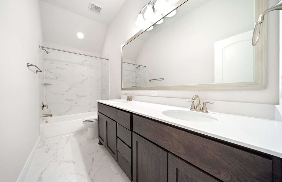 Representative furnished interior of a home built from the 3799AU by Ravenna Homes in Audubon 60′, Magnolia (Image 19).