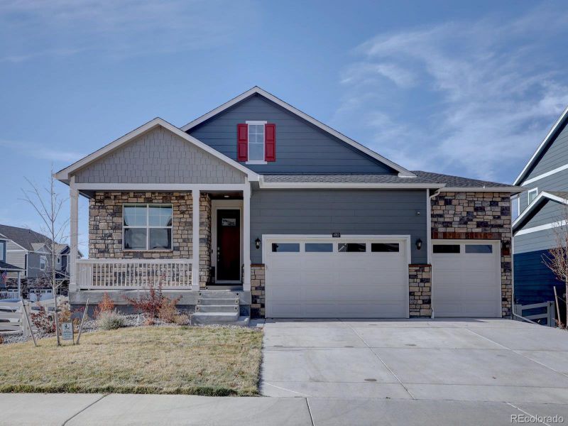Front exterior of a new home in Crystal Valley Pine Ridge, Castle Rock, CO, highlighting curb appeal (Image 2).
