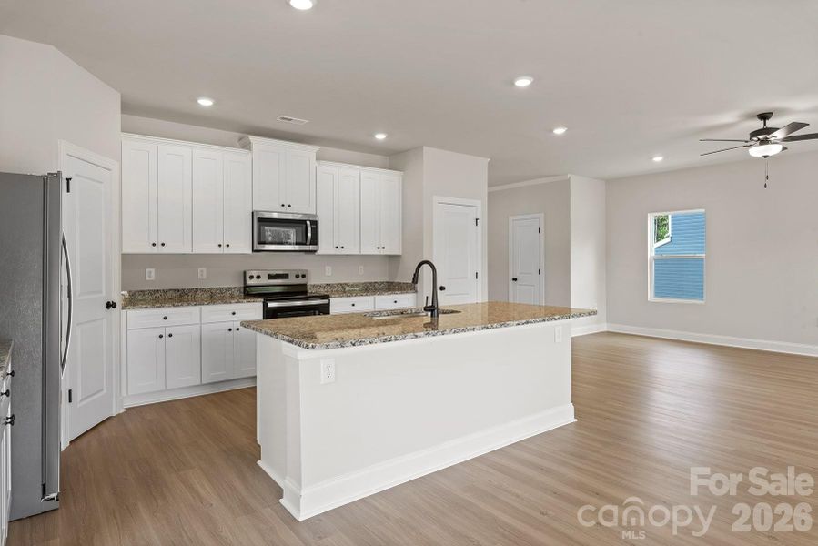 Furnished interior view inside a new home in Ascot Woods, Charlotte (Image 7).