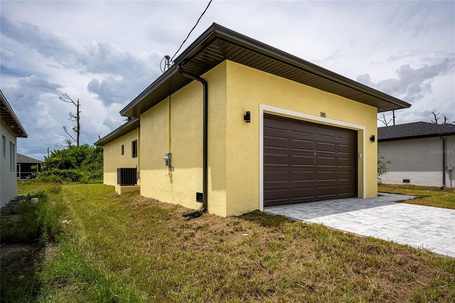 Front exterior of a new home in , Rotonda West, FL, highlighting curb appeal (Image 29).