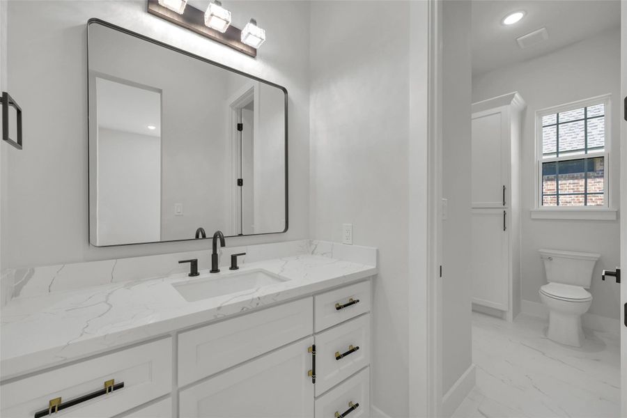 Jack and Joel bedrooms share a well-designed bath with separate sinks for convenience Jack and Joel bedrooms share a well-designed bath with separate sinks for convenience