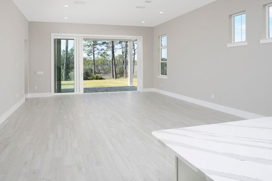 Representative unfurnished interior of a home built from the Grand Mainsail by Minto Communities in Latitude Margaritaville Watersound, Panama City Beach (Image 16).