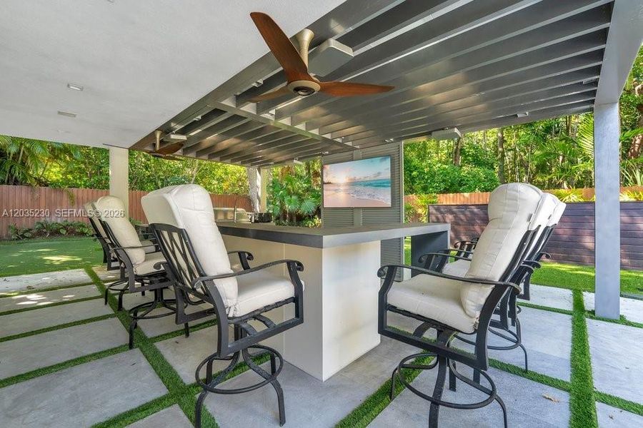 Exterior details and patio area of a home in , Pinecrest (Image 32). Exterior details and patio area of a home in , Pinecrest (Image 32).