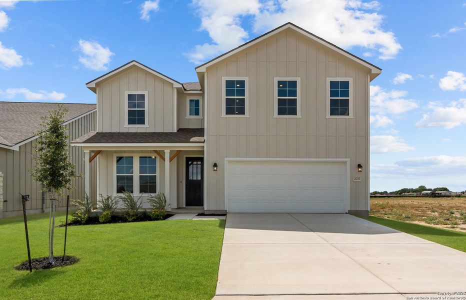Front exterior of a new home in Weltner Farms 50’s, New Braunfels, TX, highlighting curb appeal (Image 21).