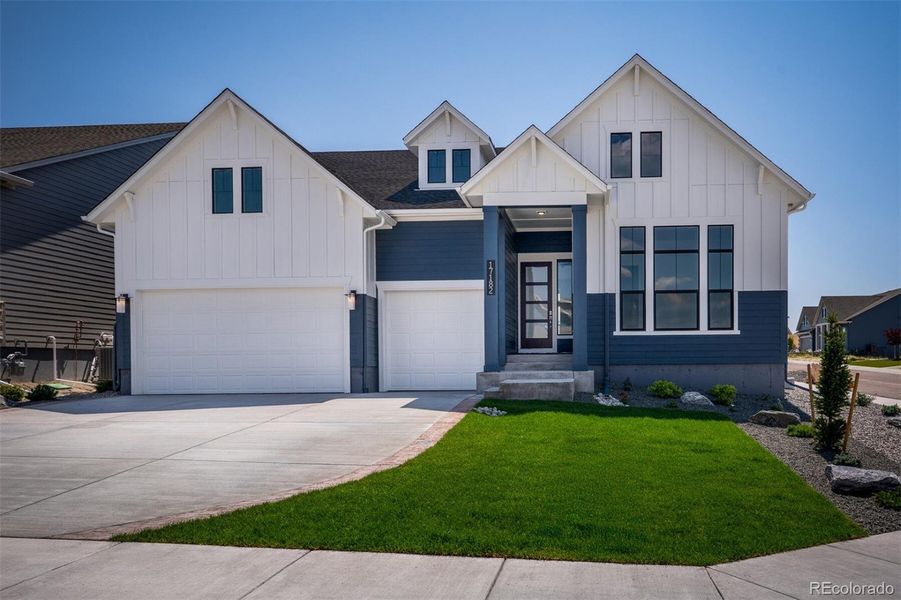 Front exterior of a new home in Cloverleaf - Pinnacle Collection, Monument, CO, highlighting curb appeal (Image 2).
