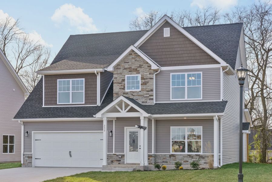 Front exterior of a new home in Summerfield, Clarksville, TN, highlighting curb appeal (Image 1). Front exterior of a new home in Summerfield, Clarksville, TN, highlighting curb appeal (Image 1).