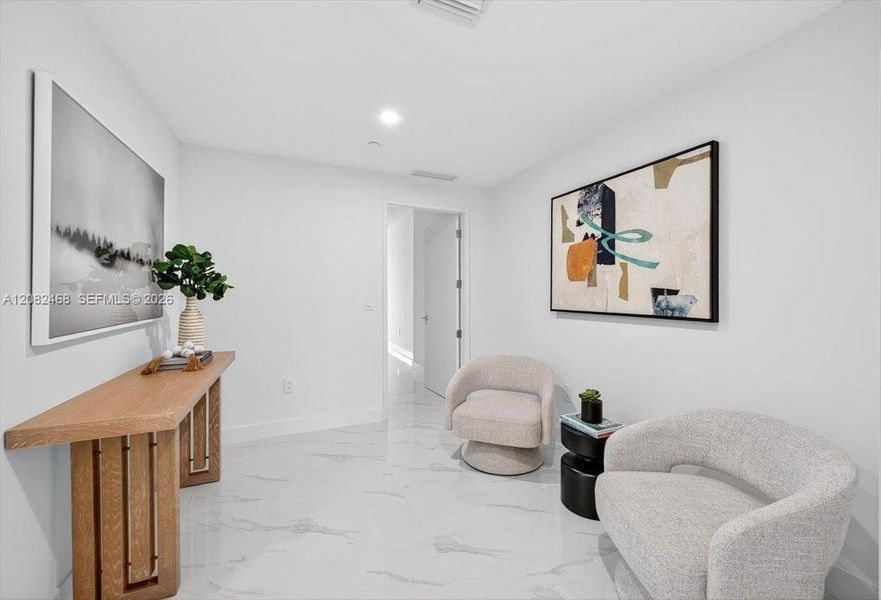 Furnished interior view inside a new home in Aria Reserve, Miami (Image 10).