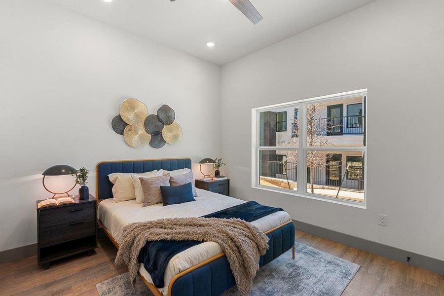 2nd Bedroom with wood finished floors, ceiling fan, and recessed lighting