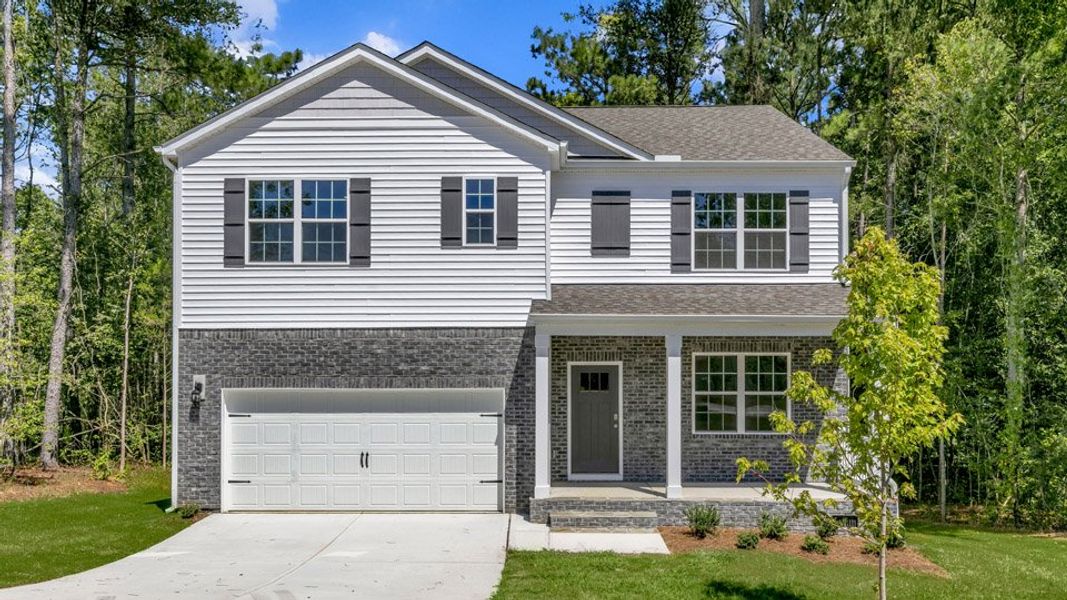 Representative exterior photo of a completed home built from the HAYDEN by D.R. Horton in McKay Place, Lillington, NC (Image 5). Representative exterior photo of a completed home built from the HAYDEN by D.R. Horton in McKay Place, Lillington, NC (Image 5).