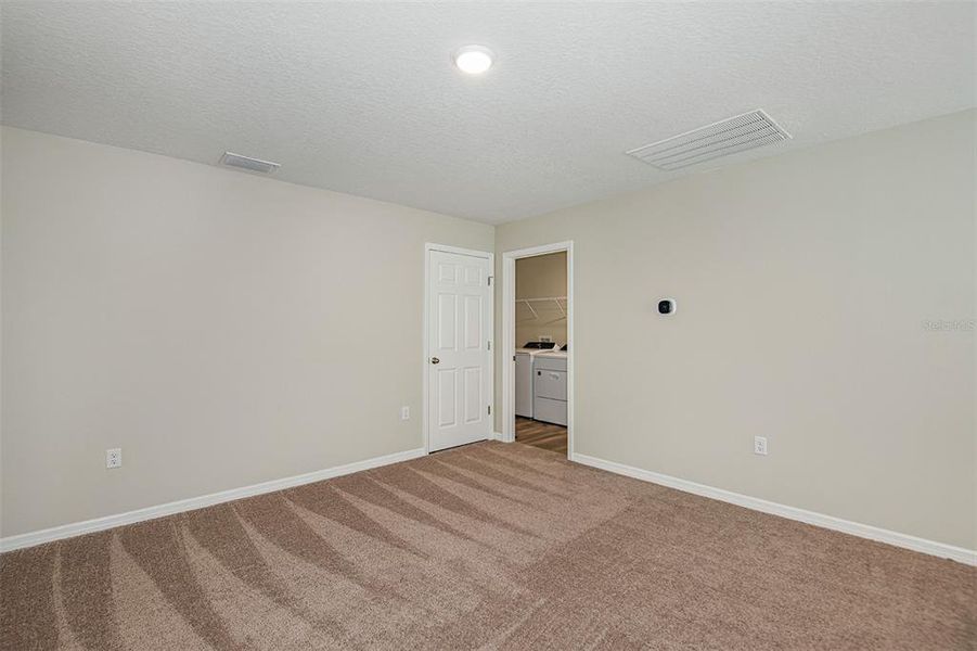 Spacious, unfurnished interior of a new home in Scenic Terrace, Haines City (Image 23).