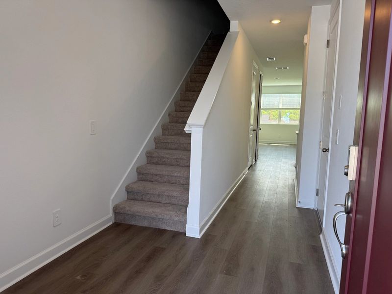 Front entry opens up into bright and airy foyer
