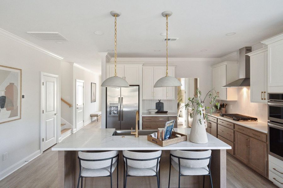 Furnished interior view inside a new home in Tidewater at Lakes of Cane Bay, Summerville (Image 8).
