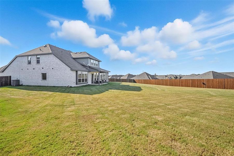 Exterior details and patio area of a home in Villages of Walnut Grove, Midlothian (Image 21).
