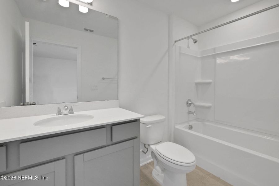 Furnished interior view inside a new home in Amberly, Green Cove Springs (Image 12).