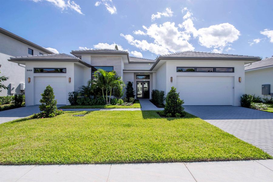 Exterior details and patio area of a home in Symphony at Jupiter, Jupiter (Image 3).