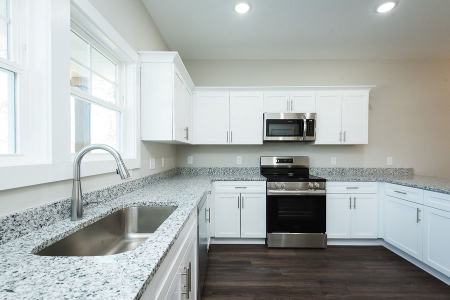 Representative furnished interior of a home built from the Ford by Foundation Home Builders LLC in Pallini Place, Ossipee (Image 7).
