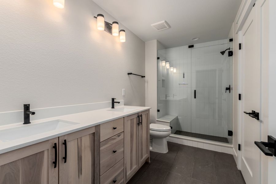 Representative furnished interior of a home built from the Luxe by Scott Felder Homes in Westerly, Erie (Image 12).