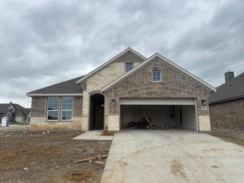In-progress construction of a new home in Cedar Ridge Estates, Anna, TX (Image 6).