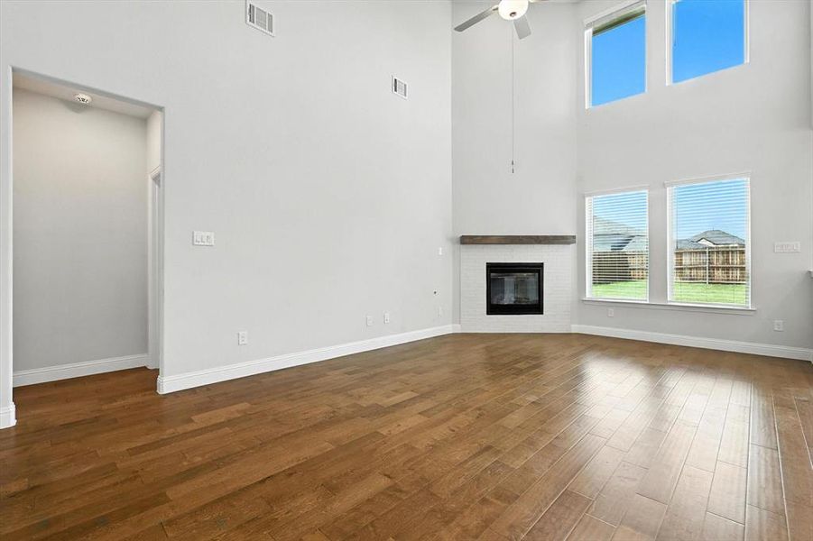 Massive living space with natural lights, remote shades/window coverings.