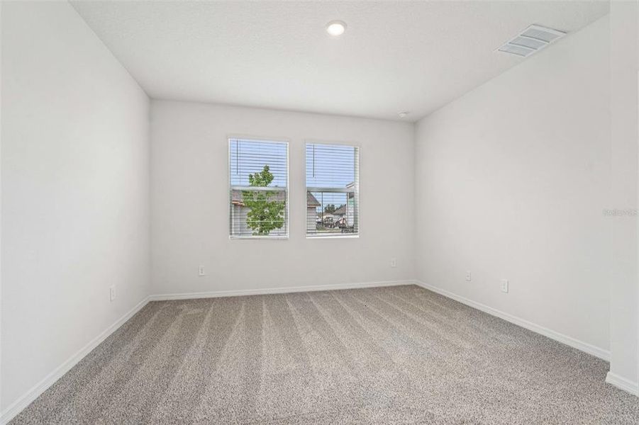 Spacious, unfurnished interior of a new home in The Grove at Stuart Crossing - Premier Series, Bartow (Image 13). Spacious, unfurnished interior of a new home in The Grove at Stuart Crossing - Premier Series, Bartow (Image 13).