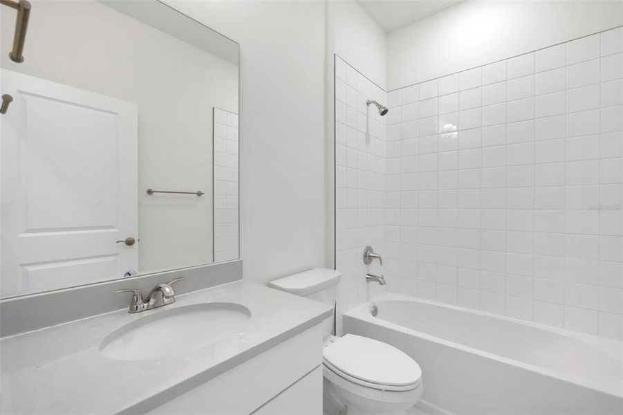 Furnished interior view inside a new home in Brystol North at Wylder, Port St. Lucie (Image 9).