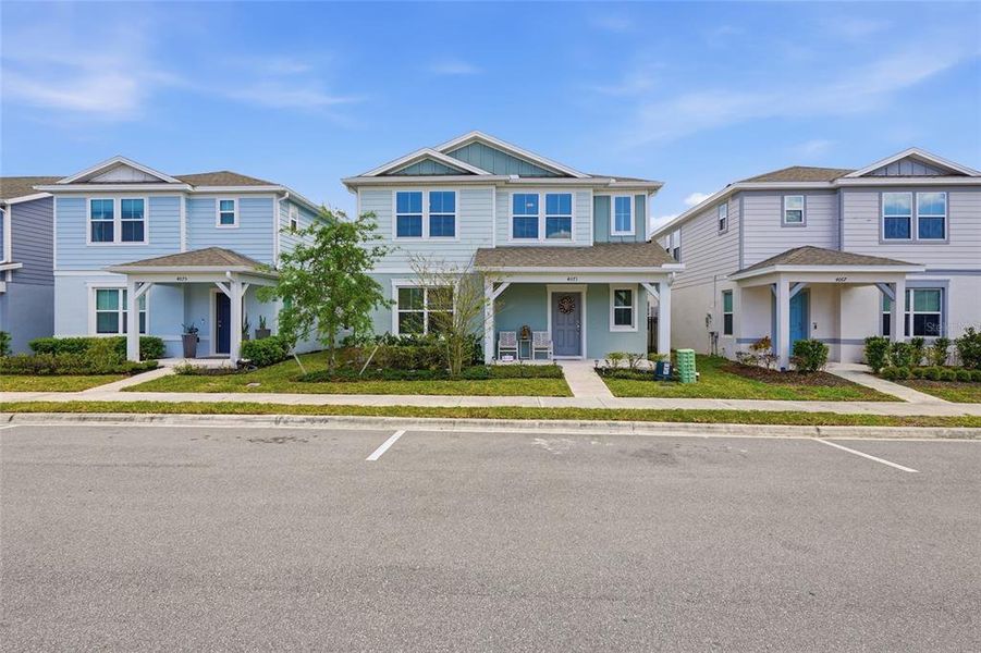 Front exterior of a new home in Winding Meadows, Apopka, FL, highlighting curb appeal (Image 28).