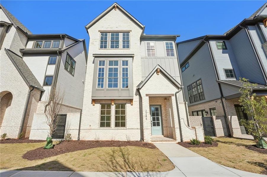 Front exterior of a new home in Park Walke, Alpharetta, GA, highlighting curb appeal (Image 26).