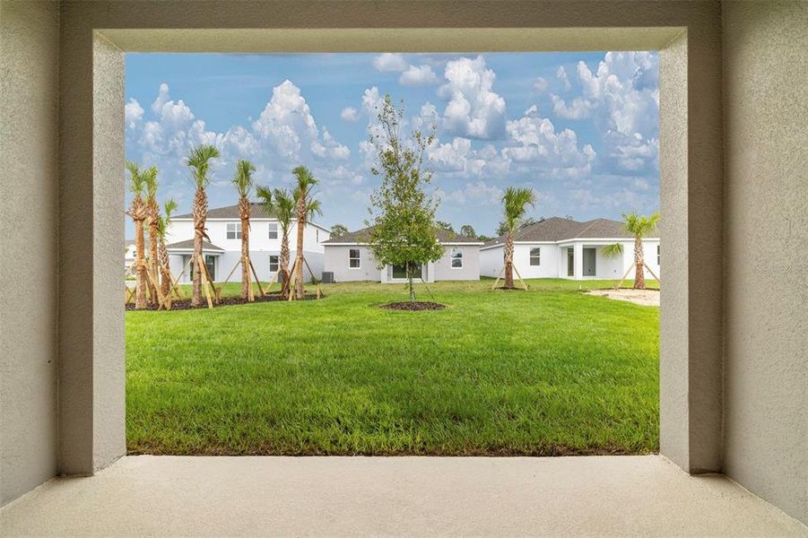 Exterior details and patio area of a home in Trinity Gardens, Deland (Image 2).